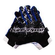 Youth dirt bike gloves with a black base, white splatter design, blue accents, and bold "Saints of Speed" branding.