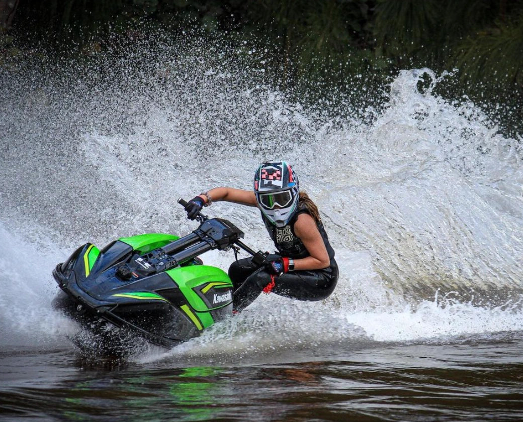 Jet ski rider carving through the water